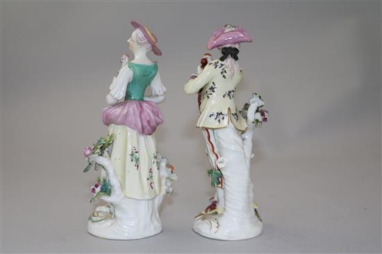 A pair of Derby figures of the Italian Farmers and a pair of Derby candlestick figures, 20.5cm, losses (4)